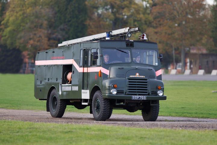 a truck is parked in the grass
