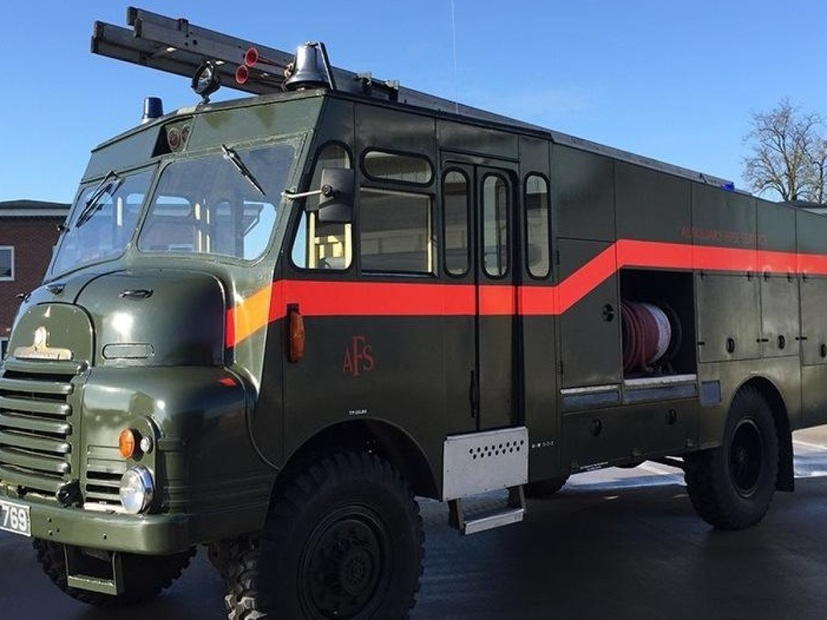 a truck is parked on the side of a road